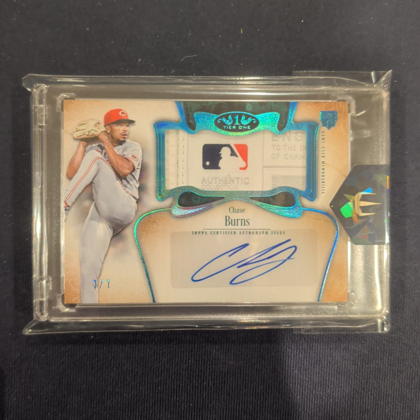 Chase Burns 2026 Tier One RC Logoman Autographed Jumbo Relic Laundry Tag 1/1
