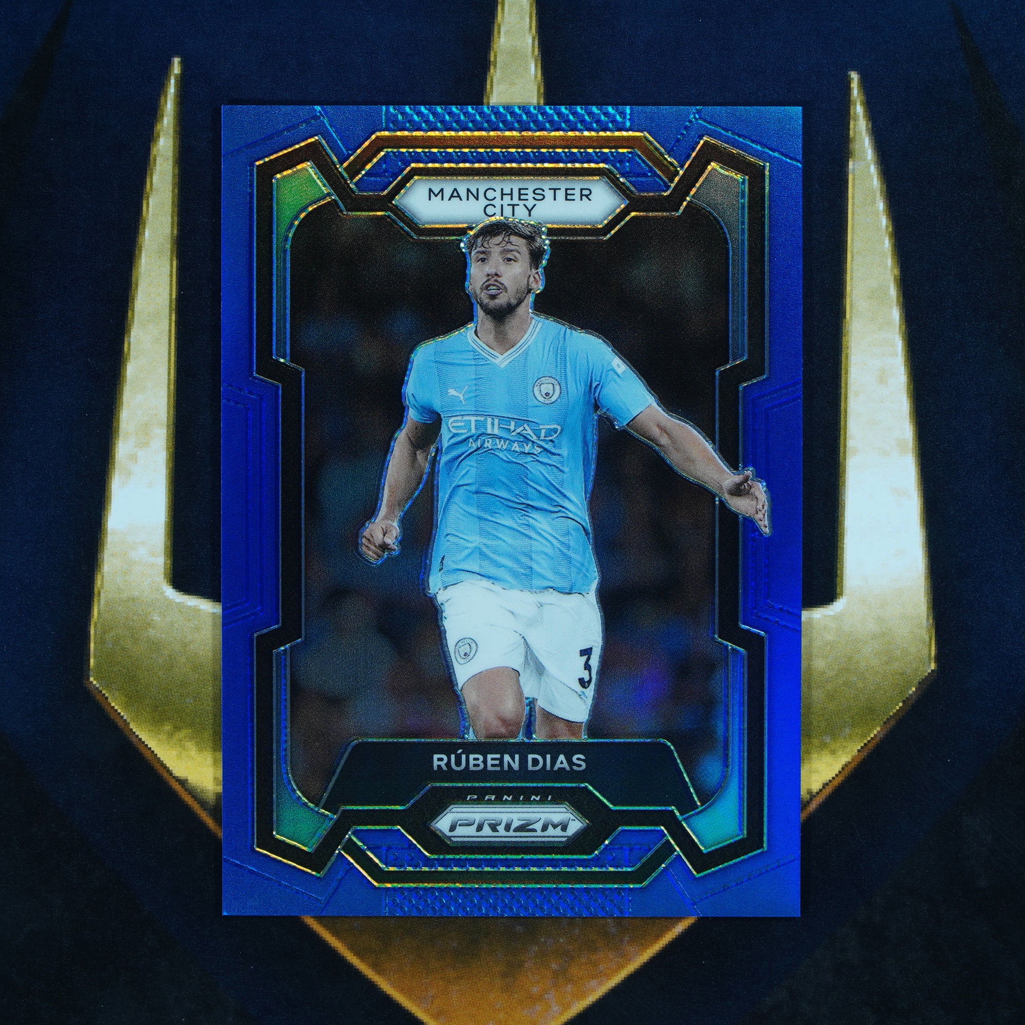 Ruben Dias 2023-24 Panini Prizm Blue Refractor /299 #15 Manchester City